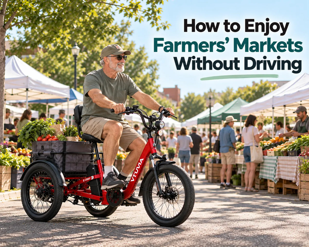 Older man riding a VTUVIA E-COZY electric trike with fresh produce at a farmers market