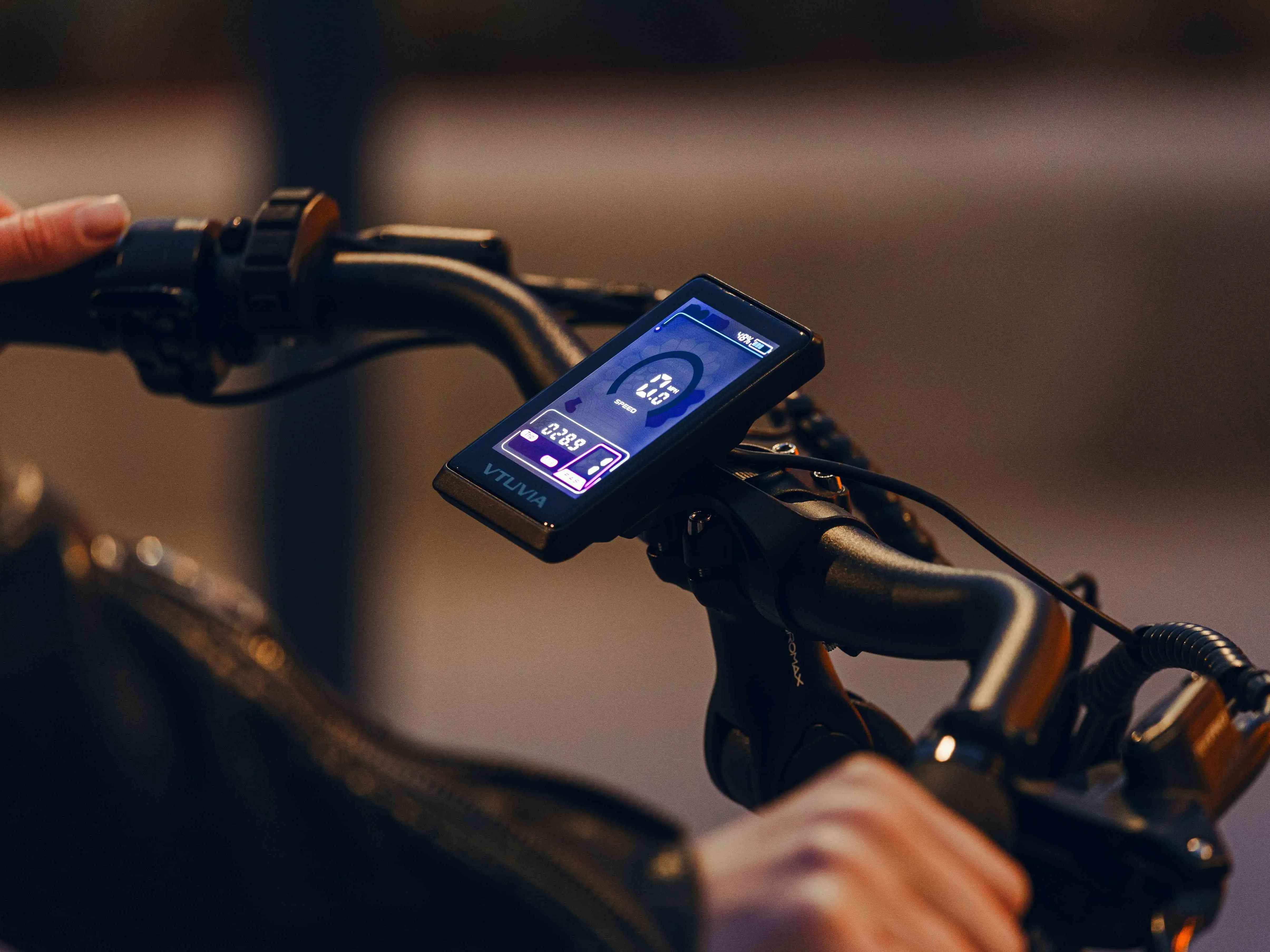 CMB Pro 500W mid-drive electric city bike on urban street, commuter electric bike