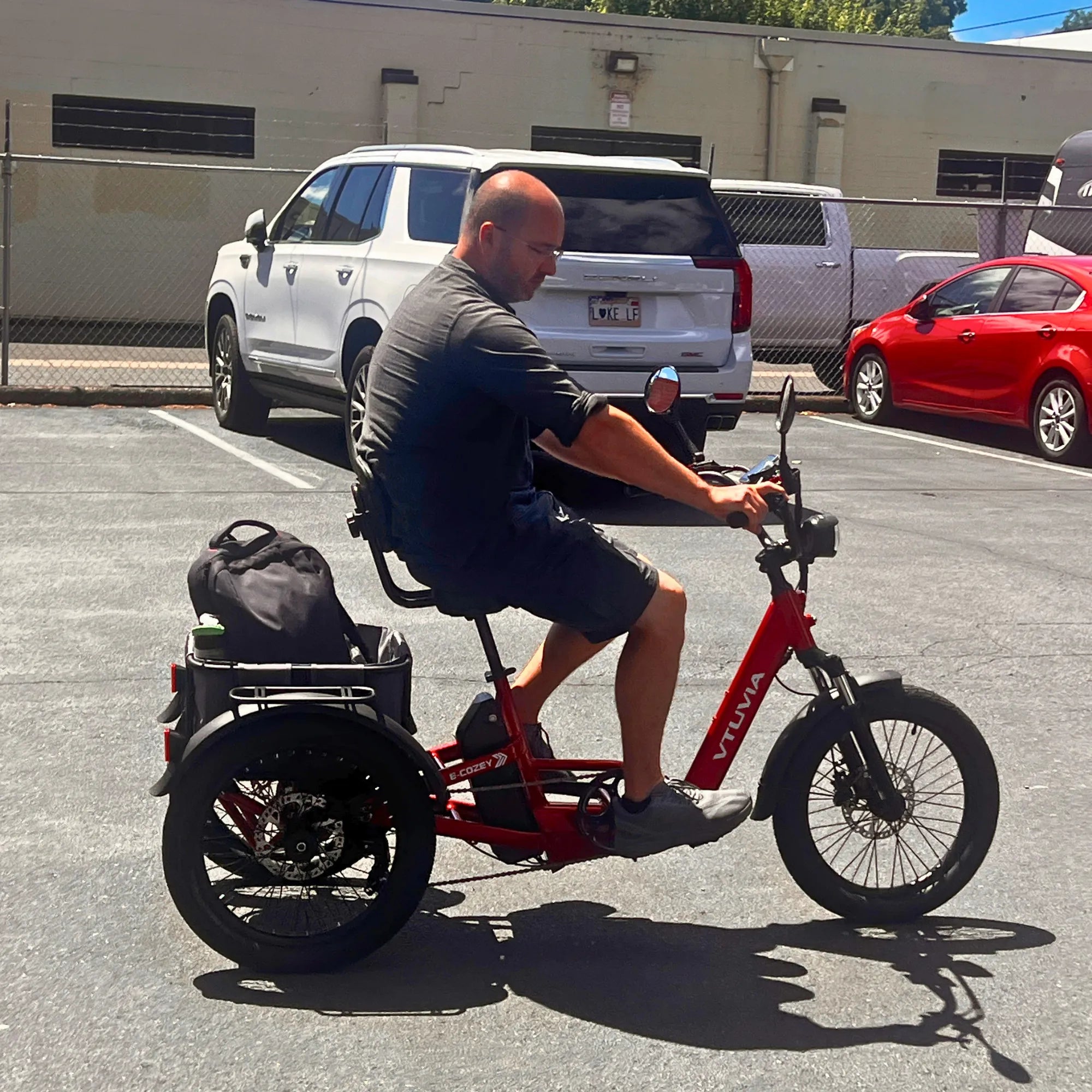 VTUVIA E-COZEY electric tricycle side view during a real test ride with stable three-wheel design